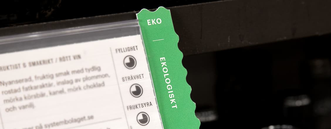 Hyllkantsetikett för information om ekologisk dryck